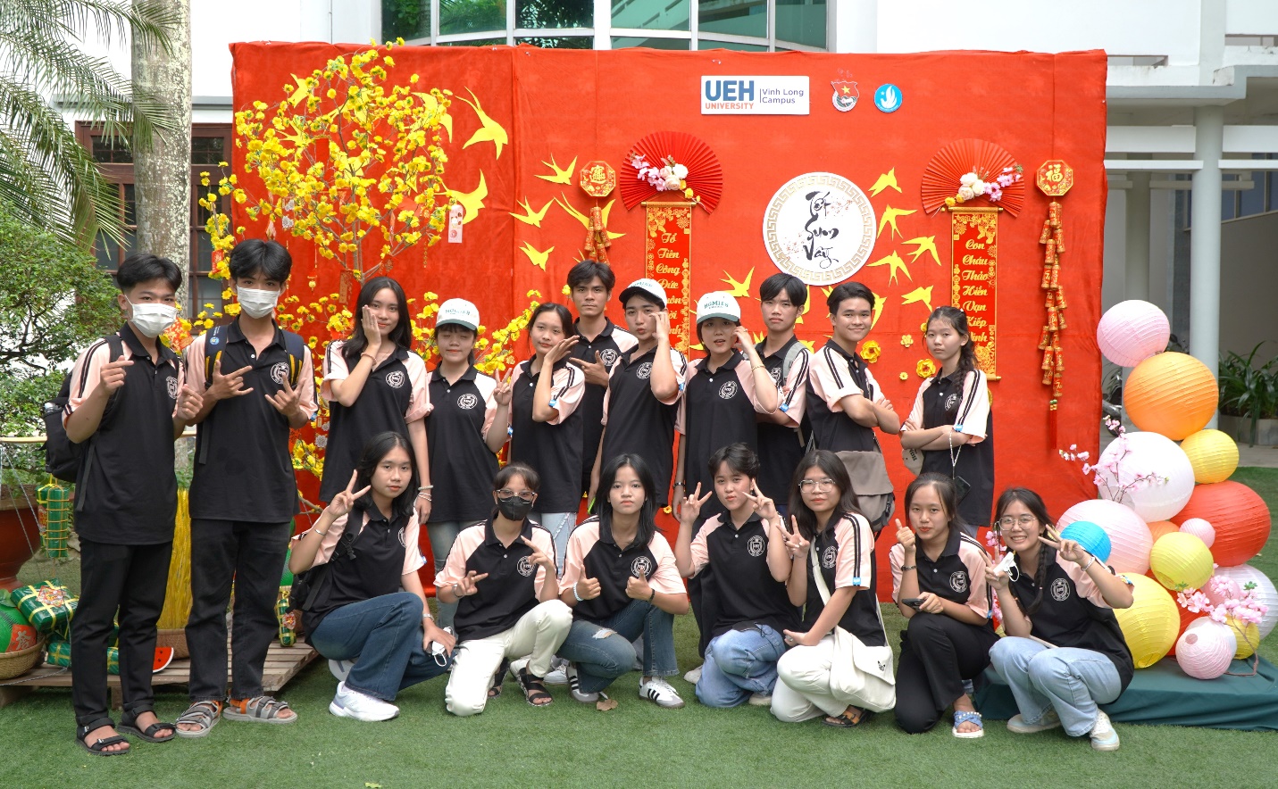 A group of people posing for a photoDescription automatically generated